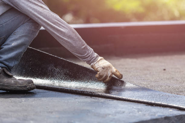 Professional Waterproofing technician working in Roann, IN
